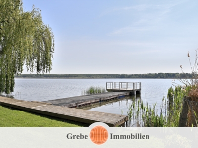 Wassergrundstück, Haus mit 4 Wohnungen, Scheune, Bungalow direkt am See und zusätzliches Bauland