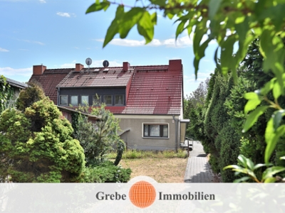 Doppelhaushälfte mit 5 Zimmern und Garage auf großem Grundstück in ruhiger Lage